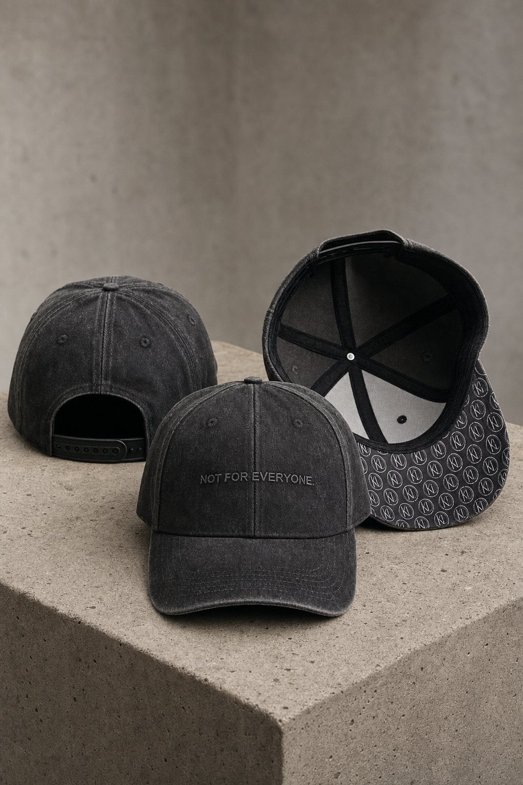 KRWN District The Code baseball caps in Washed Black on concrete — back, front and under-brim monogram detail #Color_Washed Black