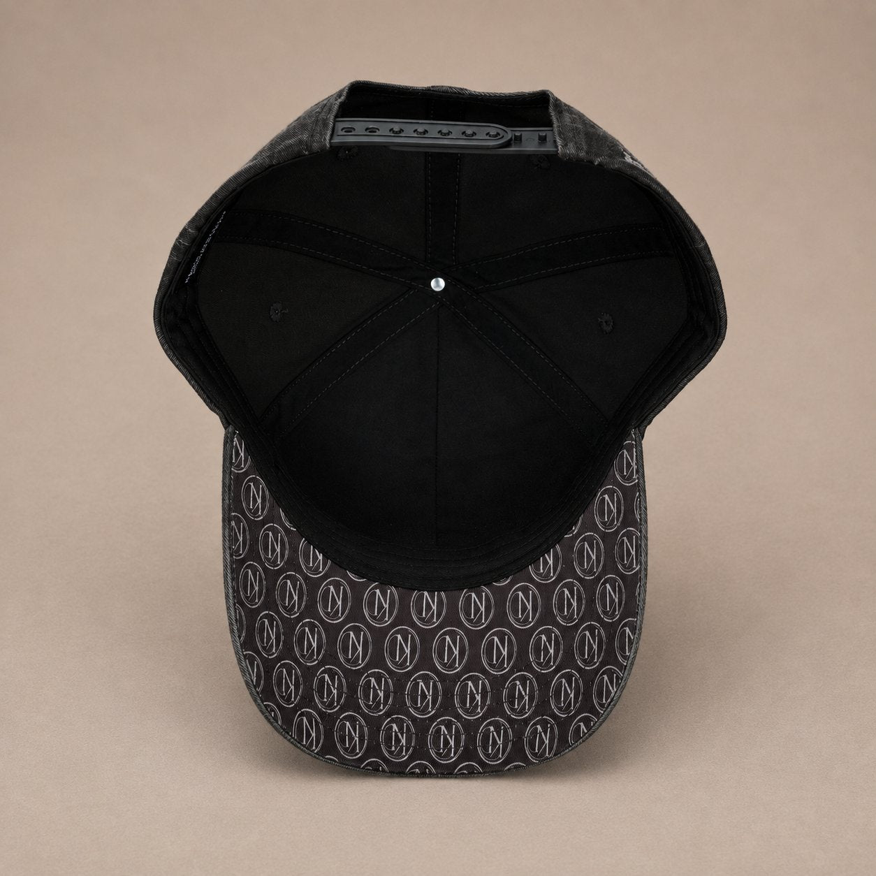 KRWN District The Code — Washed Black, inside view with KD monogram lining (AI-generated)