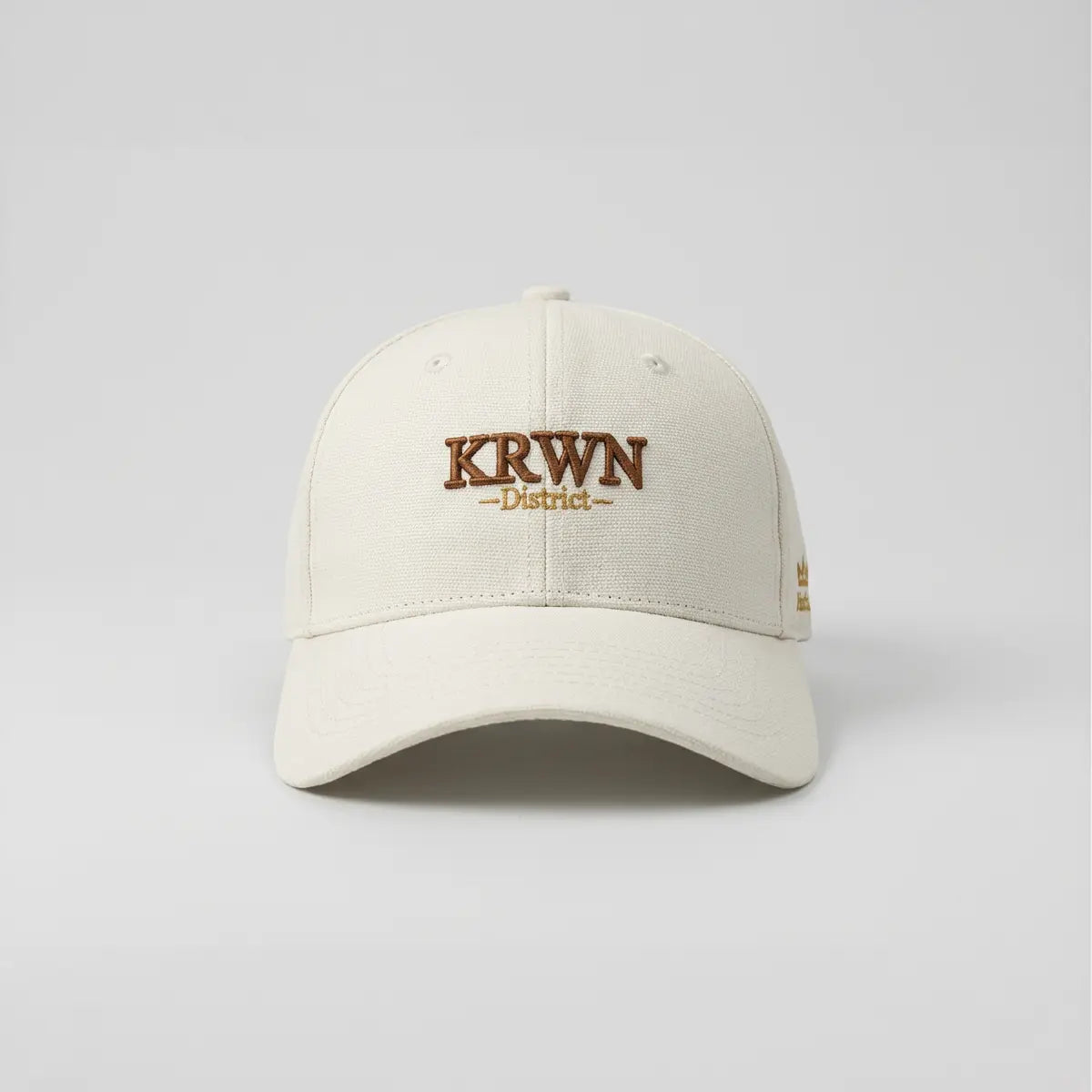 Premium Baseball Cap Beige, Front View — KRWN District Rule the District '26