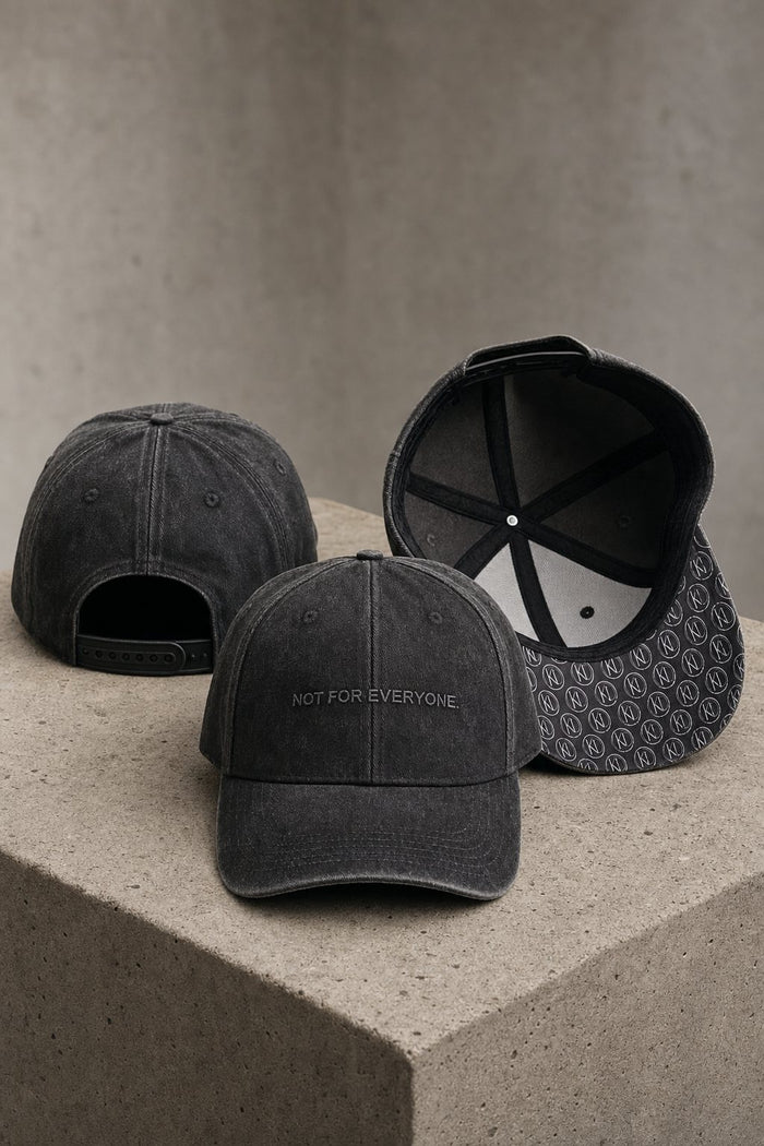 KRWN District The Code baseball caps in Washed Black on concrete — back, front and under-brim monogram detail #Color_Washed Black