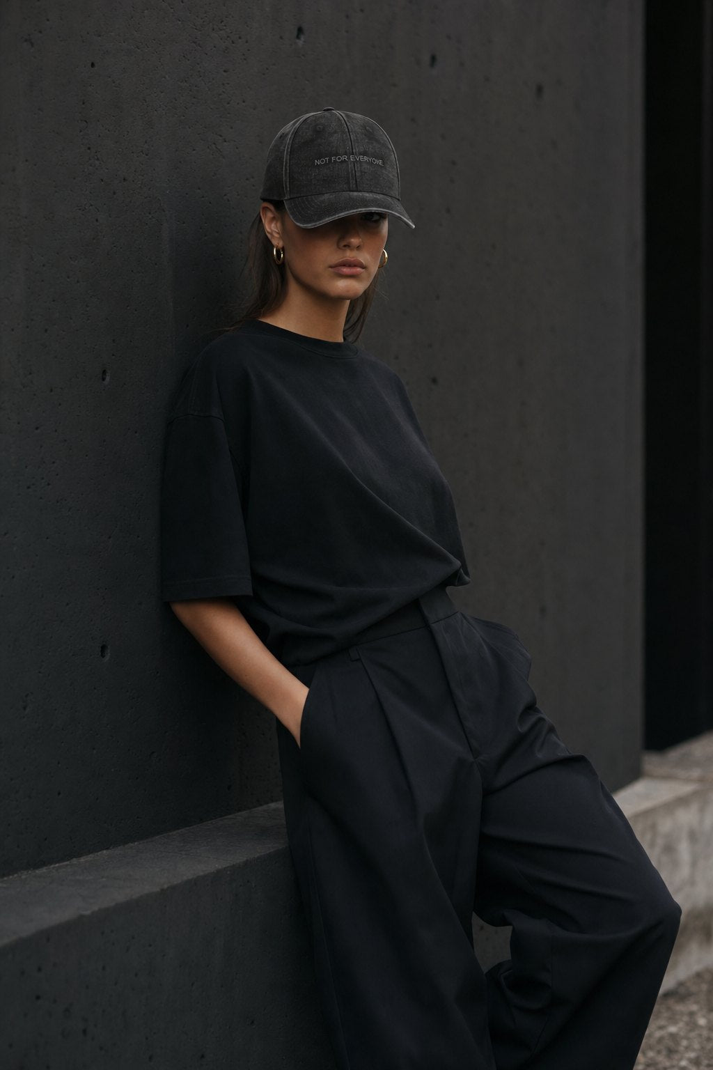 The Code Washed Black — editorial look, dark concrete