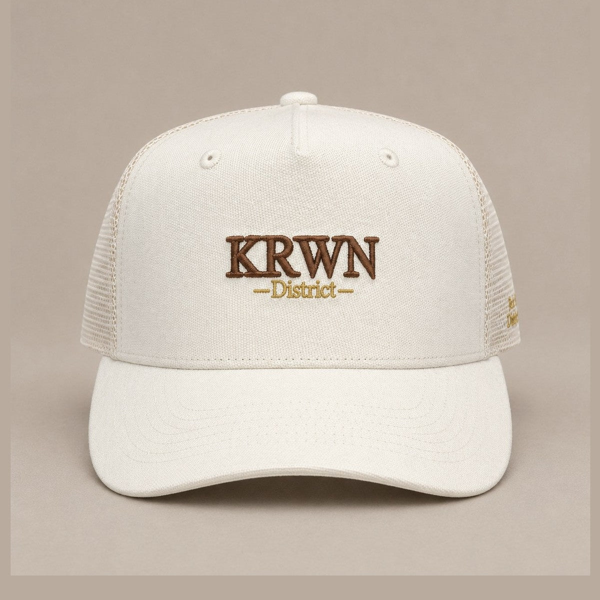 KRWN District Trucker Cap — Rule the District '26, front view with KRWN District embroidery and mesh panels